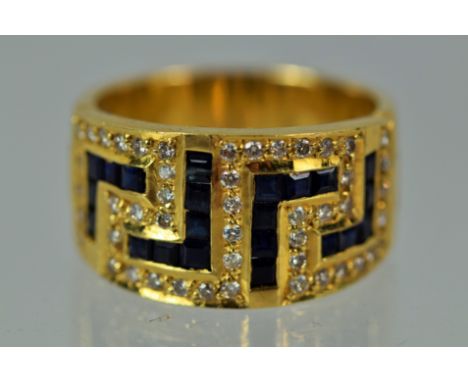 18ct Yellow Gold,  Gents dress ring set with 49 Diamonds,  each approx 0.03pts (1.47pts) and 23 oblong cut Sapphires.  Finger