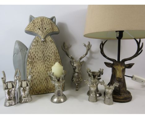 Stags Head table lamp, white metal candle holders etc and a fox garden solar light.