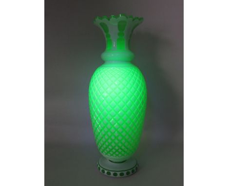 Large Bohemian white and uranium glass vase possibly Moser. Slight nibble chips to the rim, 15 3/4" tall 