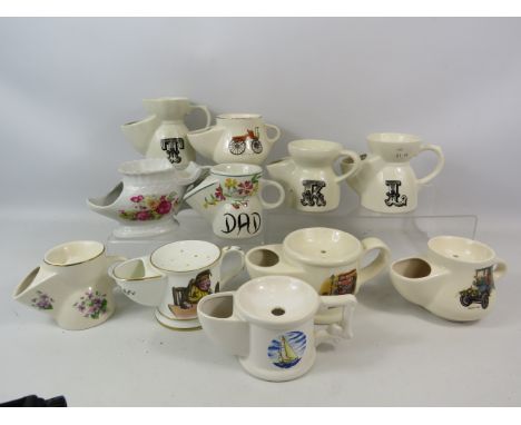11 vintage ceramic shaving mugs.