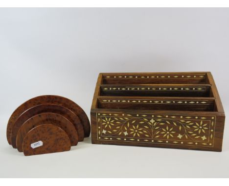 A art deco letter rack and a waterfall letter rack.