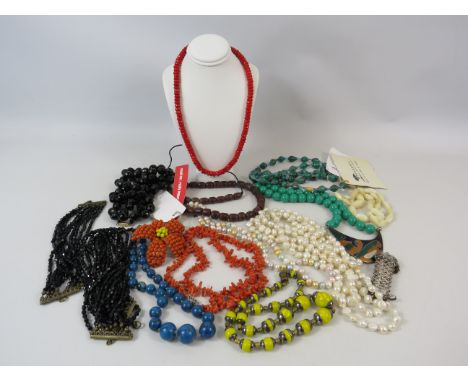 Mixed costume jewellery lot including Coral Necklace and freshwater pearls.