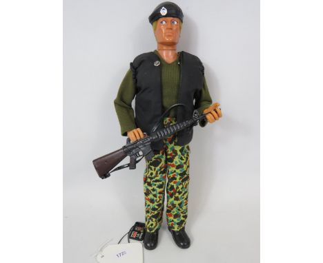 1970's Action man with speaker and moveable 'Eagle'  eyes, Comes with Kit and Rifle. See photos