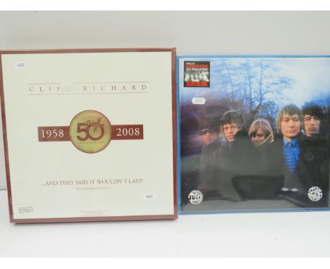 Brand new and sealed Rolling stones re-mastered LP 'Between the Buttons' plus a Brand New and Sealed Cliff Richard 8CD box se