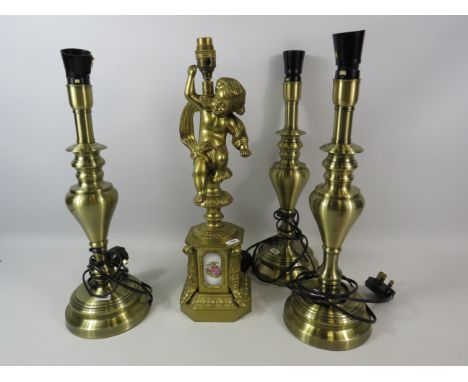 Gilt metal ornate cherub lamp base with ceramic panels plus 3 polished brass table lamps.