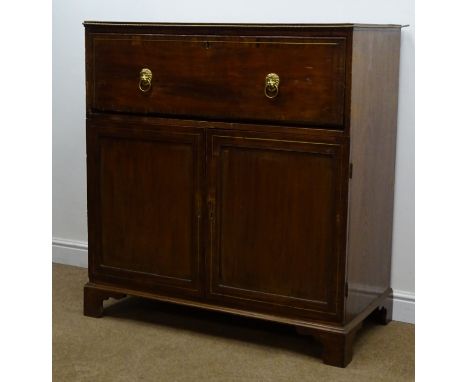 Regency brass inlaid and cross banded mahogany secretaire chest, fall front enclosing fitted interior above two cupboard door