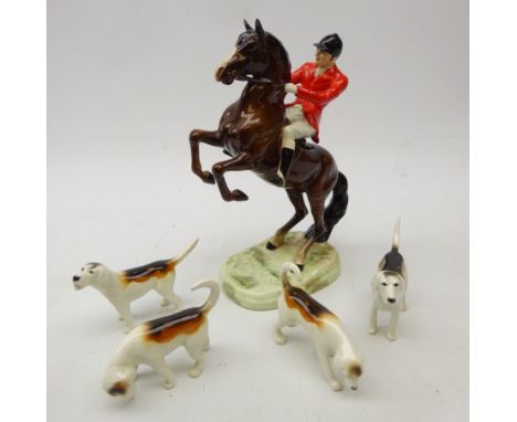 Beswick Rearing Huntsman model 868 and four Beswick Hounds (5) Condition Report Click here for further images, condition, auc