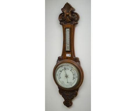 20th century oak aneroid barometer with thermometer, scroll carved case with chrome bezel, H89cm