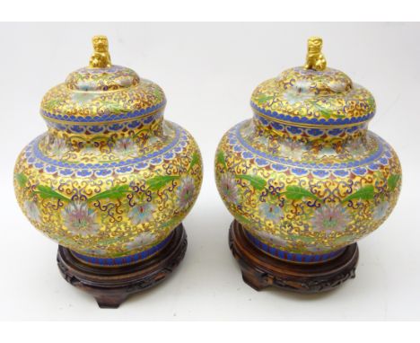 Pair 20th century Chinese Cloisonne Ginger Jars, the cover with gilt Dog of Fo finial on hardwood stands, H27cm