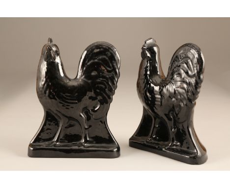 A pair of Victorian Staffordshire cockerels with black glaze. Height 30cm The RHS cockerel is in exclellent condition, there 