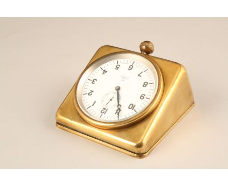A Royal Navy ships eight day Omega clock, white enamel dial with black Arabic numerals and subsidiary seconds dial. With bras