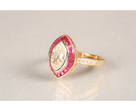 Ladies Art Deco diamond and ruby ring, 1 carat marquise cut diamond surrounded by twenty emerald cut rubies with diamond shou