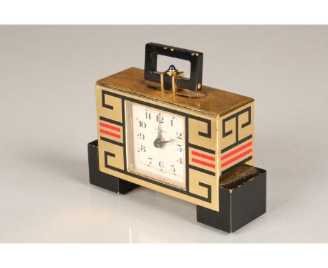 A Cartier Art Deco style brass clock white dial case decorated with black and red enamels. Swiss movement with case. 0091TE C