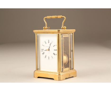 Matthew Norman repeating brass carriage clock. Height 13cm