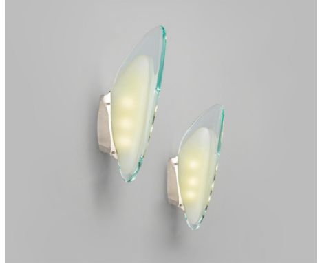 MAX INGRAND (1908 - 1969) An elegant pair of 'Le Cozze' sconces, model no. 1552, for Fontana Arte, c.1957. Nickel plated bras