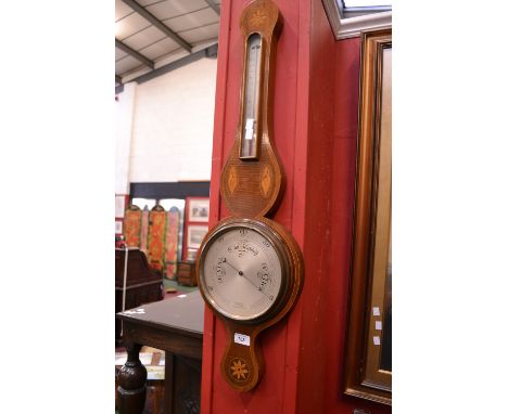 An Edwardian mahogany banjo barometer, Benn Franks Optician, Hull, Hanley etc.