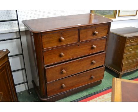 A Victorian mahogany chest, moulded top, two short cockbeaded drawers over three graduated long, button handles, plinth base,