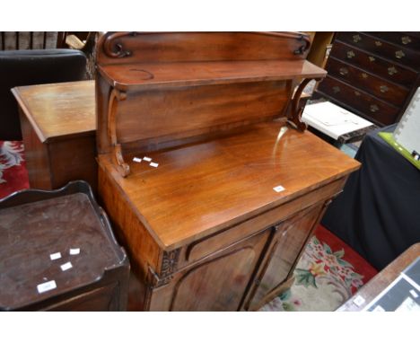 A Victorian mahogany chiffonier, shelf and shaped supports to top, long drawer over two arched panel doors, plinth base, circ