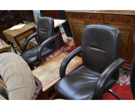 A pair of retro leatherette office chairs; a retro G-Plan style tile top coffee table. (3)