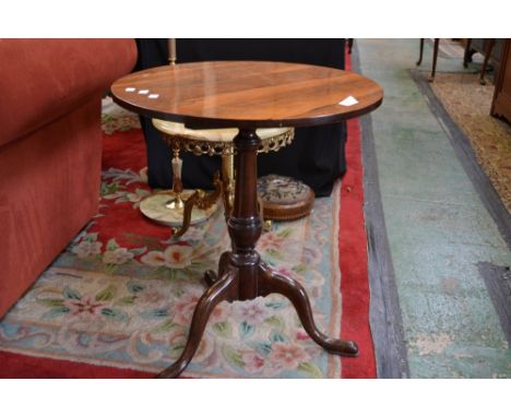 A Victorian rosewood tripod table, circular top, cabriole legs, pad feet, circa 1860. 64.5cm high x 56cm wide.