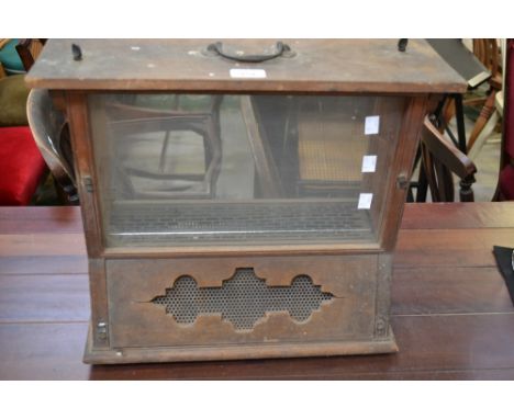 A vintage apiarist's observation hive.