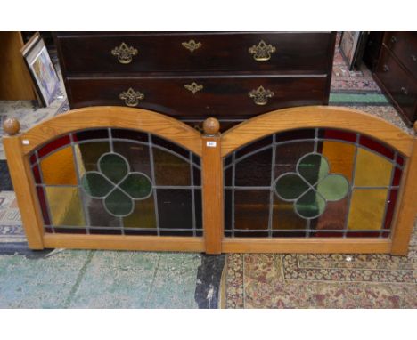 An oak and stained glass double panel