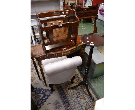 A Victorian style button upholstered nursing chair; a reproduction mahogany gilt metal mounted serpentine hall table; a magaz