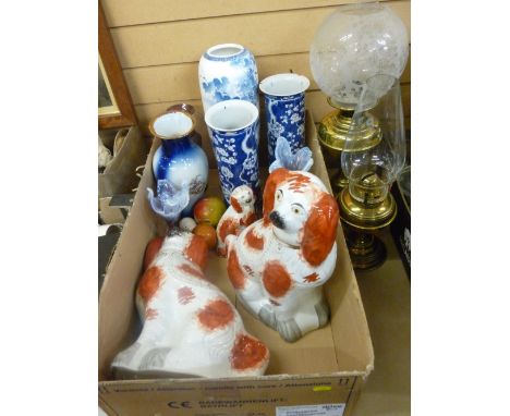 Two vintage brass oil lamps, a pair of Prunus chimney vases (damage), colourful glassware and Staffs dogs etc