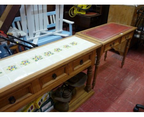 Neat stripped pine Edwardian writing table with tooled red leather top, two drawers and corner turned supports and a stripped