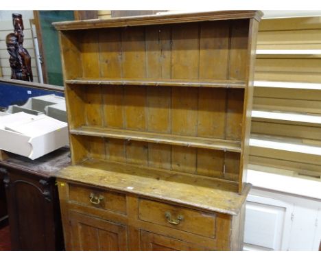 Compact pine dresser for full restoration having a twin shelf rack over a base of two drawers and two cupboards, 117 cms wide