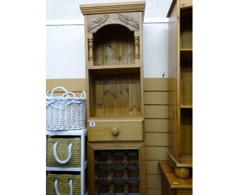 Modern pine kitchen shelving unit with lower wine rack and central drawer