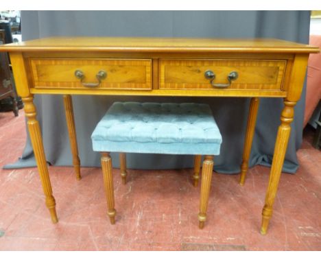 Reproduction crossbanded yew wood two drawer side table on reeded supports, 75.5 cms high, 99 cms wide, 41.5 cms deep and a s