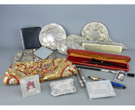 Audrey Hepburn style cigarette holder and one other, two EPNS dressing table part hand mirror sets, a vintage beadwork bag an