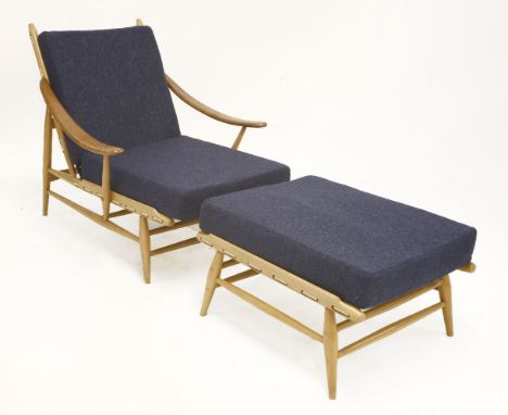 An Ercol 442 recliner and ottoman,1960s, designed by Lucien Ercolani, with blue upholstered seats and backs (2)