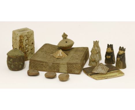 *Ian Godfrey (1942-1992), a stoneware desk sculpture, the top centred with four pyramids, the base incised with motifs,15cm w