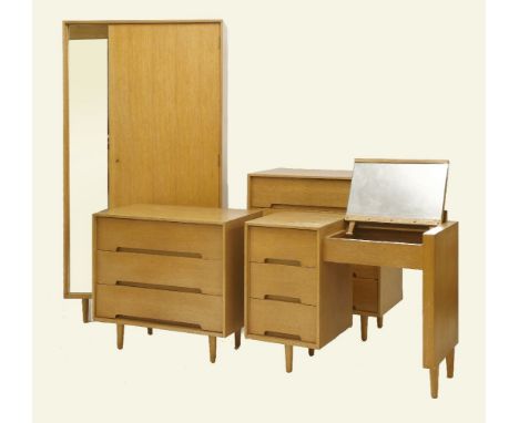 A Stag 'C' Range bedroom suite,designed by John and Sylvia Reid, comprising:two chests of drawers,each with four or three dra