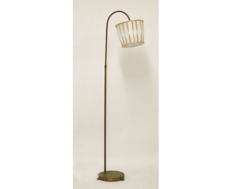 A brass standard lamp,with a two colour shade,155cm high