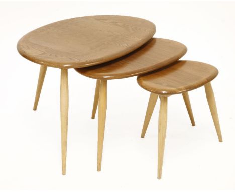 An Ercol 'Pebble' nest of three tables,65cm wide (3)