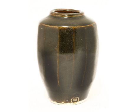 *Bernard Leach (1887-1979), a glazed and multifaceted vase, impressed 'BL' and with Leach Pottery marks,14cm high