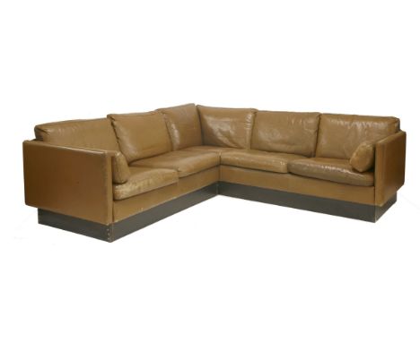 A Danish brown leather corner sofa,by Tamms, with a black plinth225cm wide