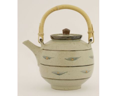 *David Leach (1911-2005),a Lowerdown Pottery teapot, with horizontal bands, blue and orange details and a bamboo handle, rais