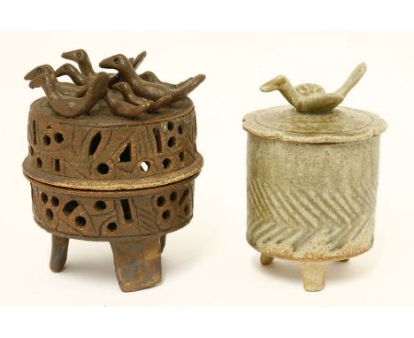 *Ian Godfrey (1942-1992), a pierced stoneware casket, the cover mounted with ten ducks, the interior with another bird,13cm h