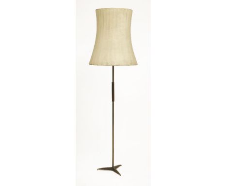 An Italian standard lamp,with a large waxed and waisted paper shade,163cm high overall