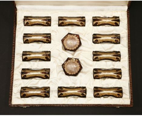 A set of twelve enamel knife rests,designed by Marylou Fauvet, anda pair of hexagonal salts,each signed 'Marylou Limoges',8 a