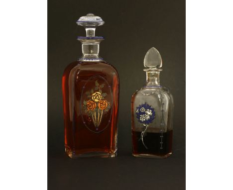 Two Art Deco glass scent bottles,designed by Georges Chevalier, each painted with enamel flower posies or a vase of flowers,1