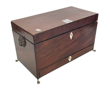 19th Century mahogany three compartment tea caddy with single front drawer, lion masks to sides raised on four ball and claw 