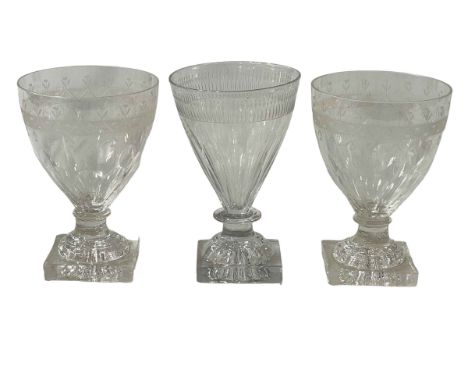 Three Georgian glass rummers with lemon squeezer bases.