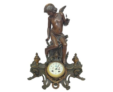 Art Nouveau spelter winged cherub clock with enamel dial, 52cm high.