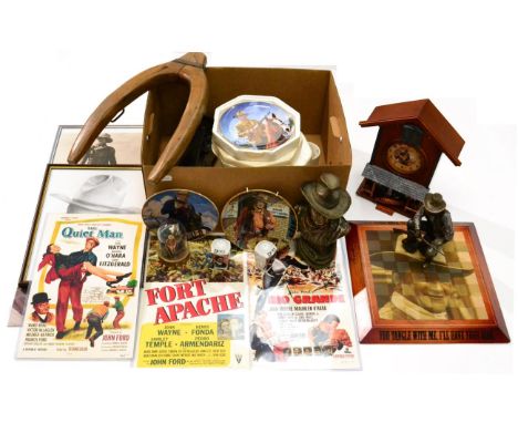 John Wayne Memorabilia including collectors plates, a framed autographed photograph, a print and a poster; two statuettes, ce