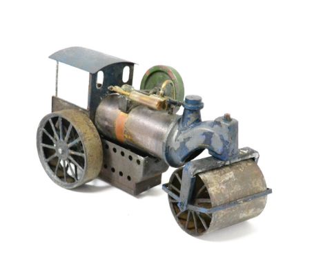 Bing Live Steam Road Roller with single oscillating cylinder and flywheel mounted on top of boiler, spoked wheels and roller 
